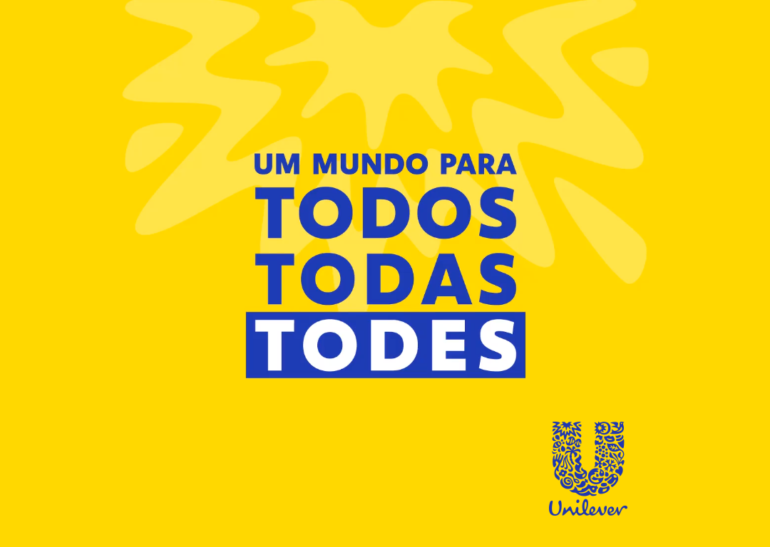 Em fundo amarelo lê-se 'Um mundo para todos, todas, todes'. Logo da Unilever abaixo.